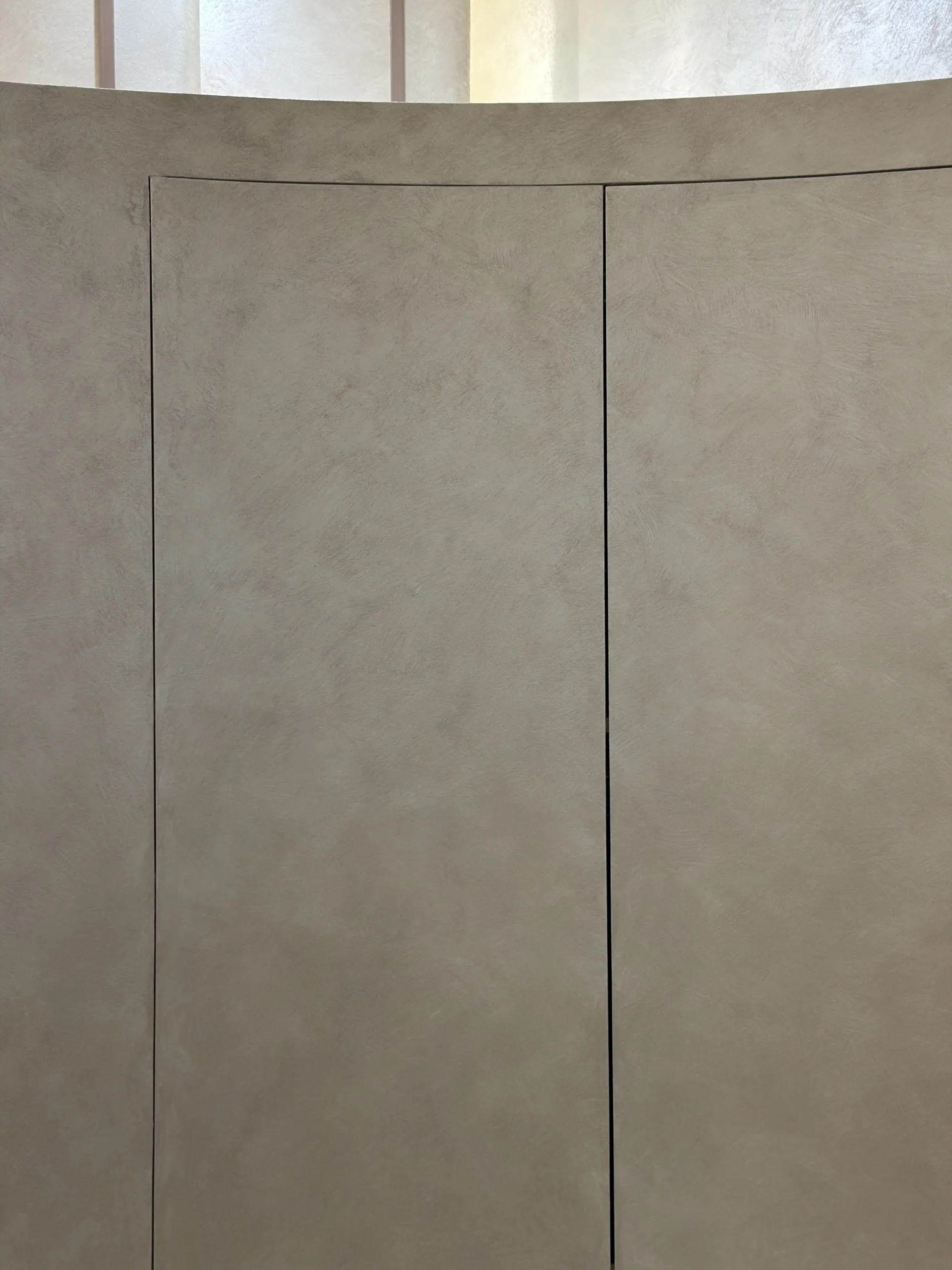 Depth Without Ornament - Study 107, a smooth microcement residential decorative finish in warm putty