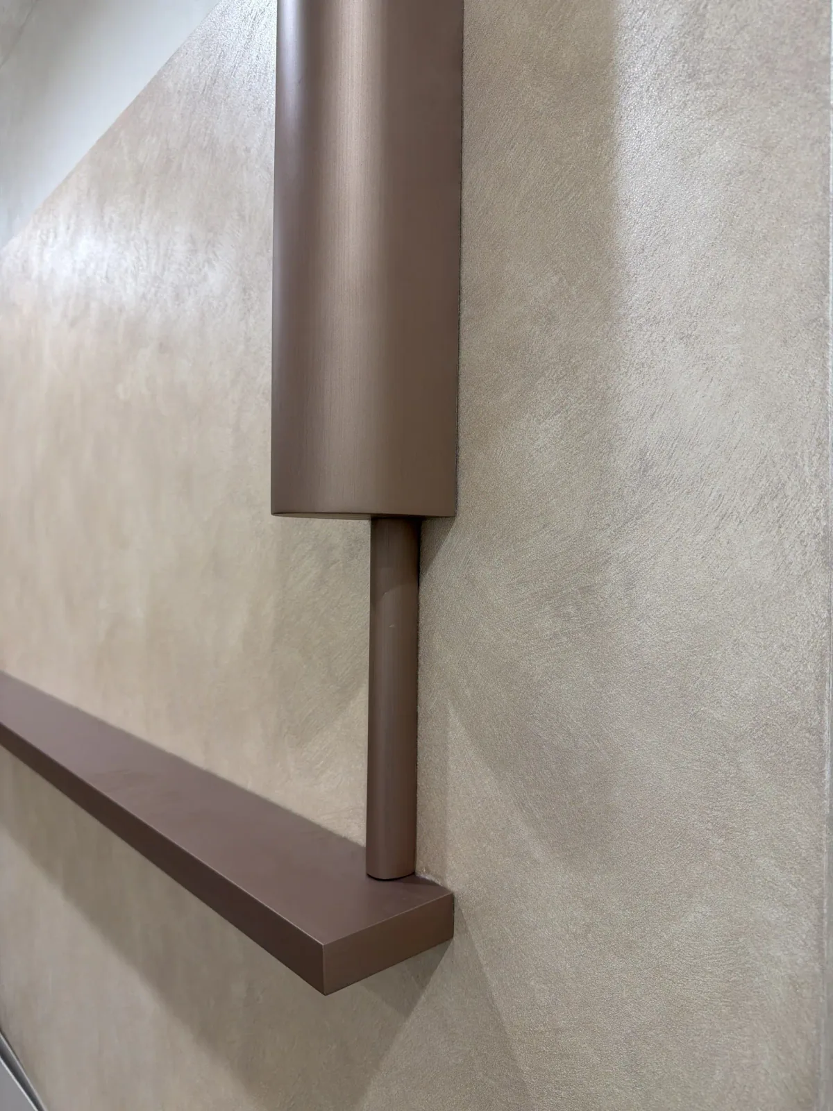 Decorative wall finish detail in a completed interior