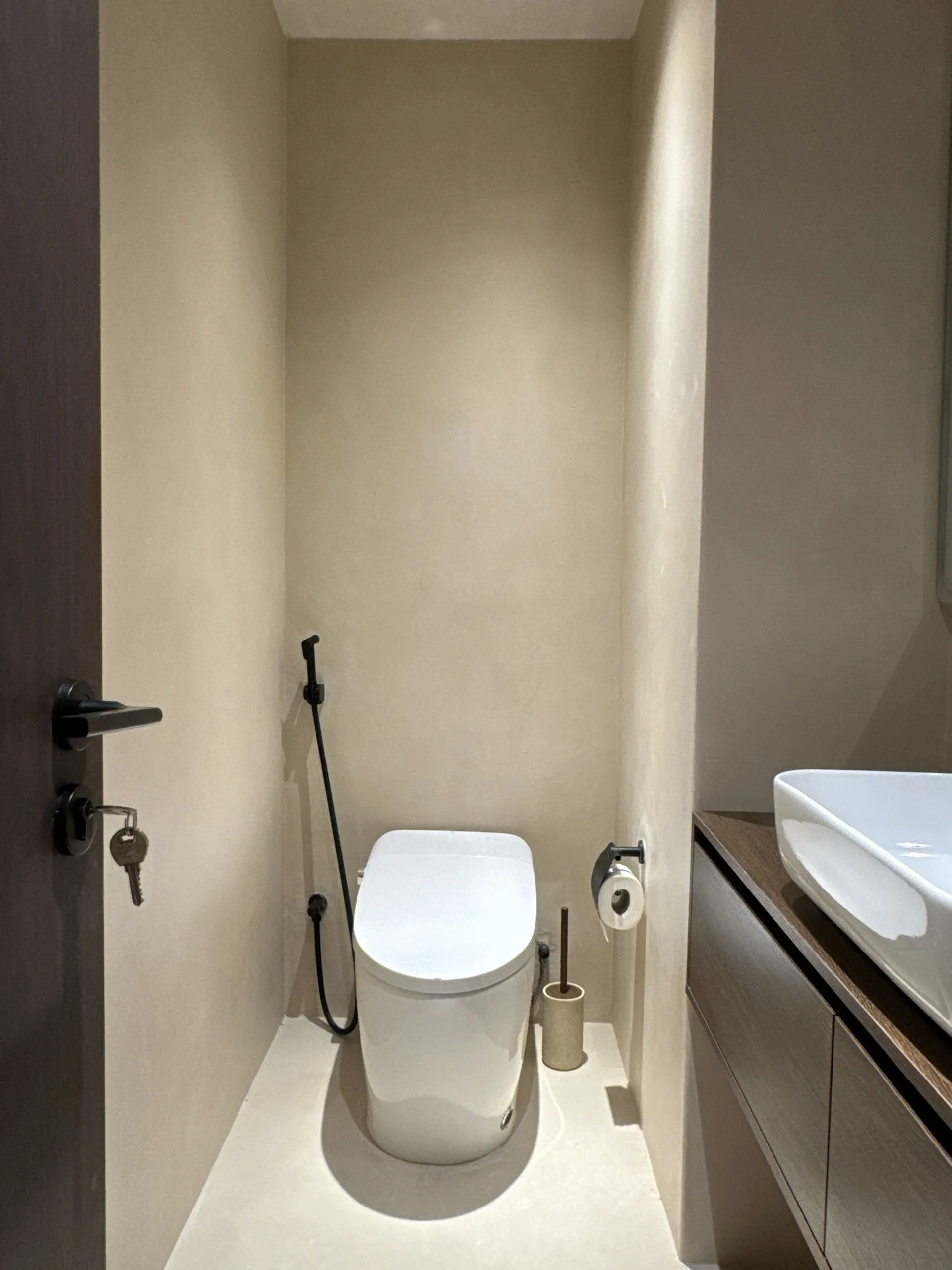A Calm Continuous Surface - Study 122, a microcement overlay residential decorative finish in soft taupe