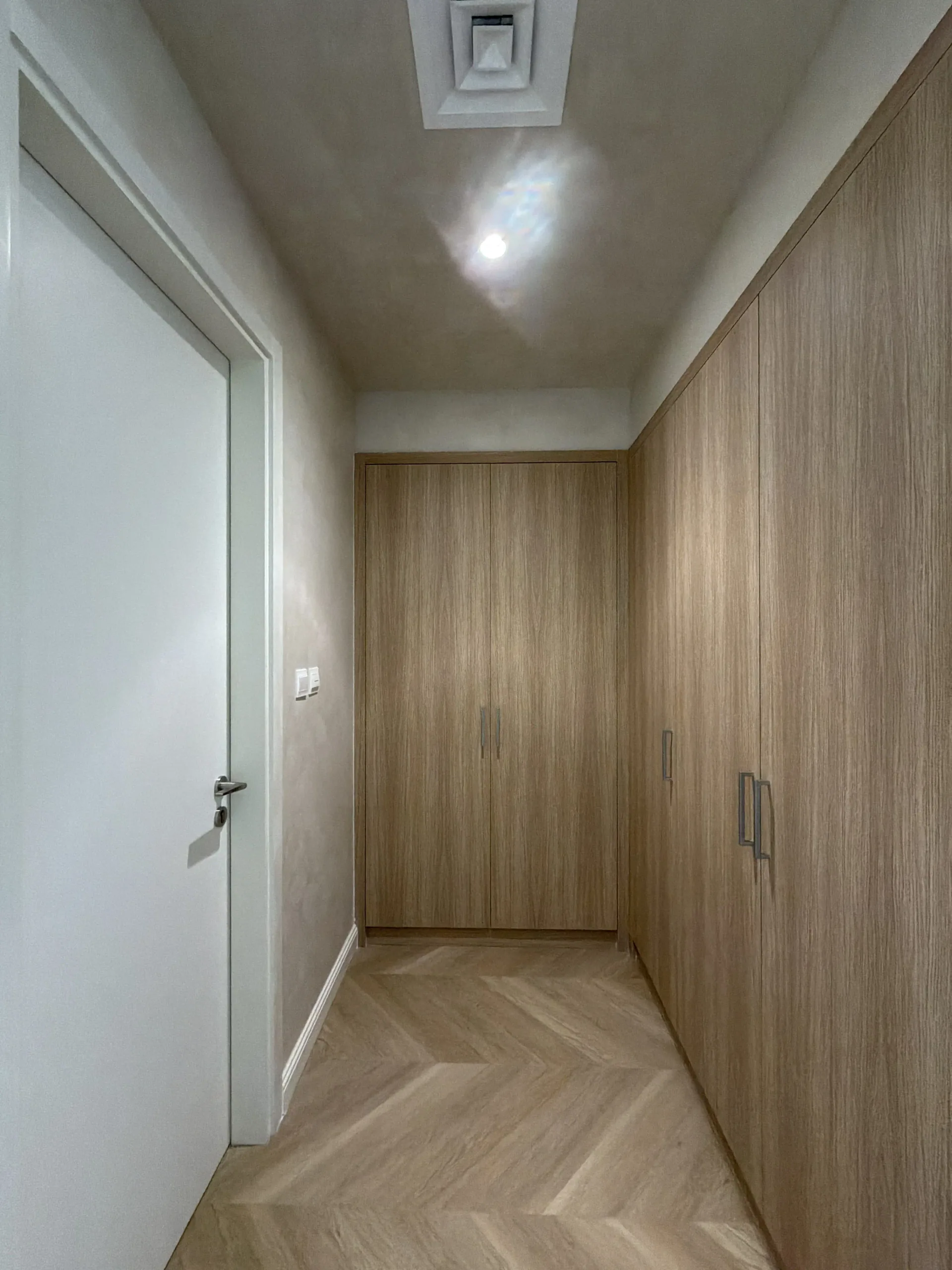 Depth Without Ornament - Study 155, a smooth microcement commercial decorative finish in warm putty