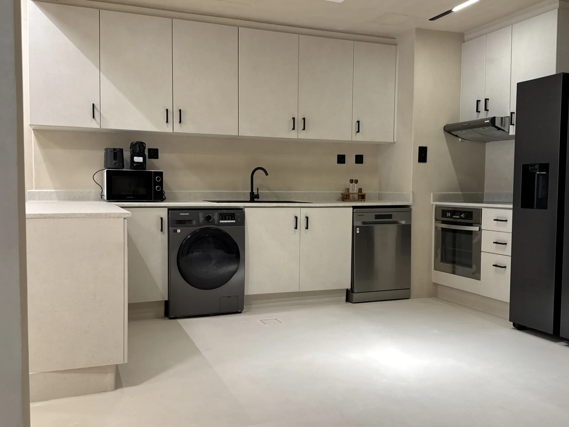 Microcement kitchen floor in a completed residential project