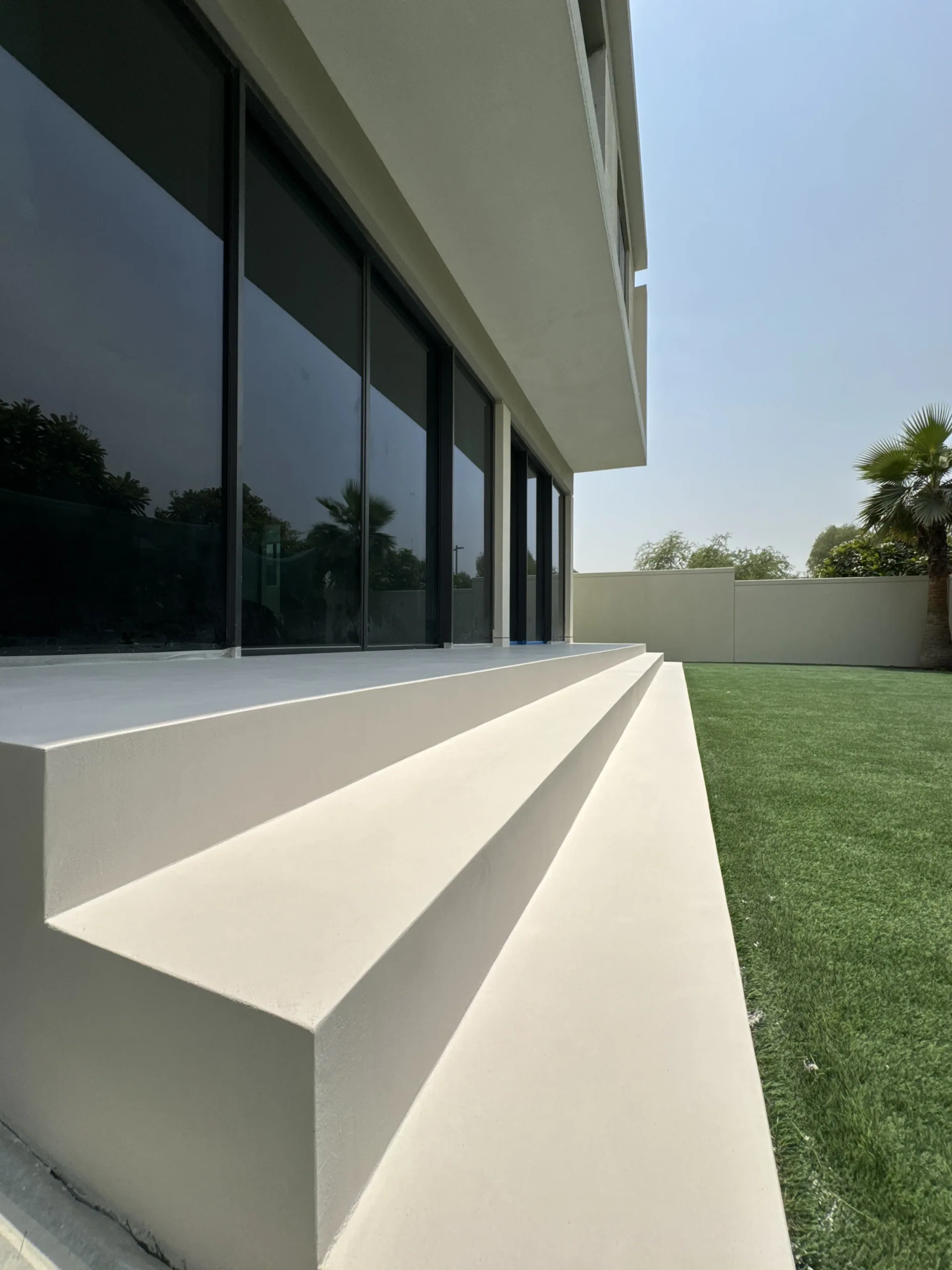 Depth Without Ornament - Study 77, a smooth microcement residential decorative finish in oyster white